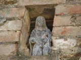 Statue de bois sur les bâtiments de l'ancien Hôtel de Normandie.